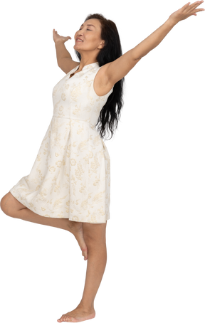 Woman in beautiful dress standing