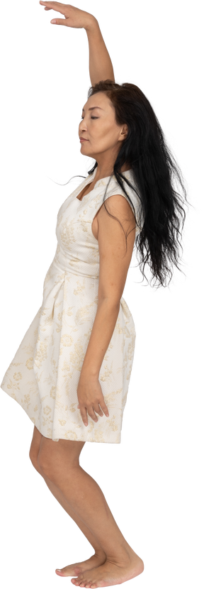 Woman in beautiful dress dancing
