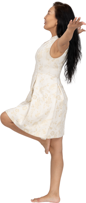 Woman in beautiful dress standing