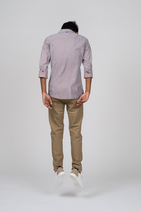Man in casual clothes jumping